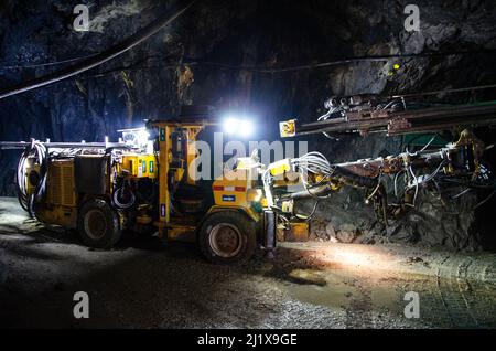 Jumbo Drill Posing at Underground Mine Stock Photo