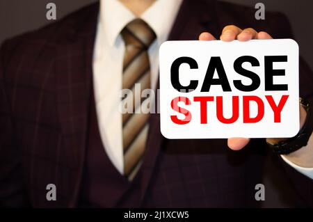Case study memo written on a notebook with pen. Stock Photo