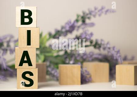 Wooden blocks with the word Bias. Prejudice. Personal opinions. Preconception. Stock Photo