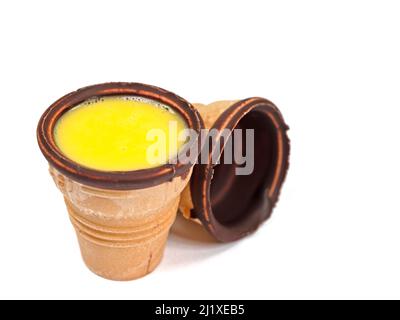 Eggnog in a waffle cup against a white background Stock Photo