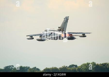 Royal Air Force Panavia Tornado GR4 fighter bomber jet plane keeping low after take off at Royal International Air Tattoo, RAF Fairford airshow