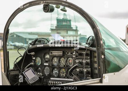 Cockpit of Gulfstream American AA-5B Tiger G-TGER light plane taking part in the Royal Aero Club air race at Sywell, UK. Stock Photo