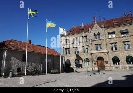 The Swedish flag and the Ukrainian flag the during Saturday in Vadstena, Sweden. Stock Photo