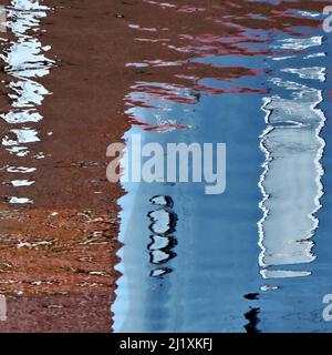 Abstract photograph, a play on light showing reflected pattern, line, shape and a varied colour pallette with light forms created by the gentle moveme Stock Photo