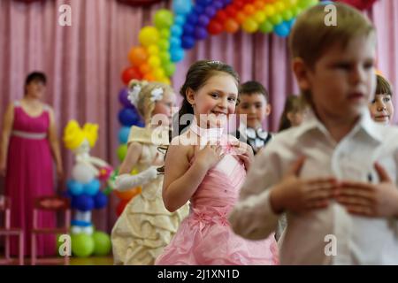 A group of children at a matinee in kindergarten. Stock Photo