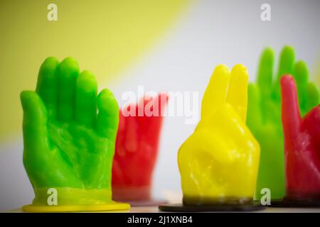 A model of a wax man's hand shows different signs. Wax cast of a hand and fingers. Stock Photo
