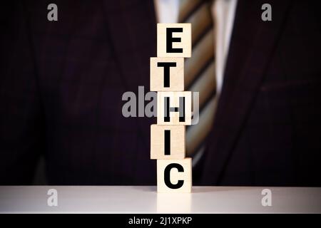 ETHICS word written on wood block, concept Stock Photo