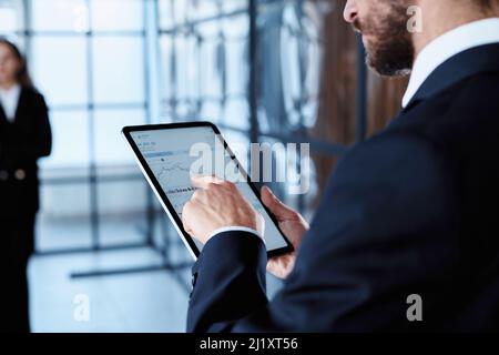 businessman using digital to analyze new information. Stock Photo