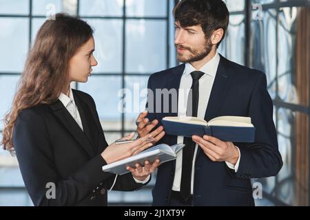 business colleagues discussing a new business plan. Stock Photo