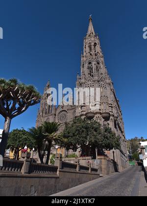 Beautiful portrait view of the Church of San Juan Bautista in the historic center of town Arucas in the north of Gran Canaria, Canary Islands, Spain. Stock Photo