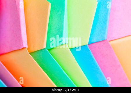 Origami abstract background, parametric structure made of colorful paper sheets, close up Stock Photo