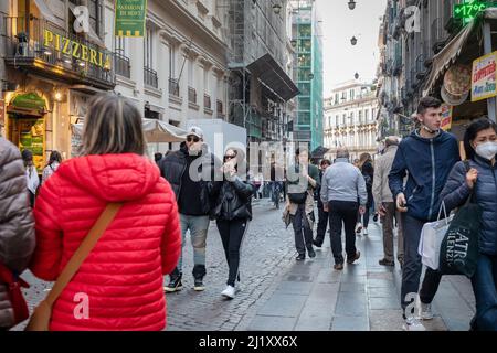 Naples, Italy - March 24, 2022: Via Toledo, in the historic center of the city people walk the street on a spring day, looking for shopping, leisure o Stock Photo