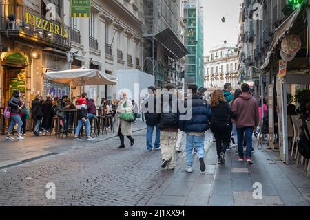 Naples, Italy - March 24, 2022: Via Toledo, in the historic center of the city people walk the street on a spring day, looking for shopping, leisure o Stock Photo