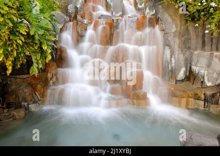 Small waterfall. Note that the water is in motion blur. Stock Photo