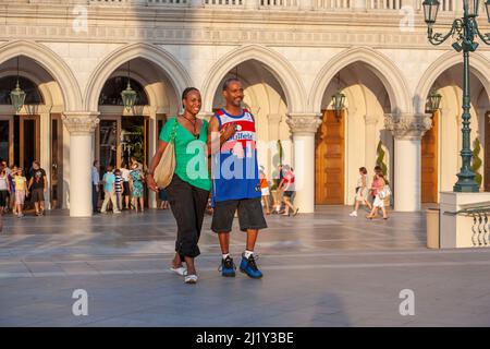 Las Vegas, USA - June 17, 2008:people enjoy the promenade at The Venetian Resort Hotel and Casino. The resort opened on May 3, 1999 with flutter of wh Stock Photo