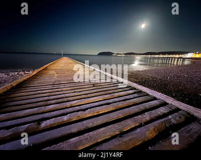 Llandudno Pier at night Stock Photo