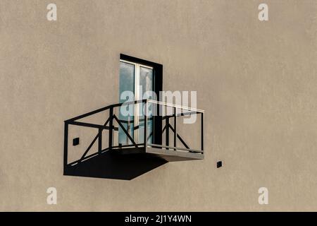 Shadows in street - alone balcony Stock Photo