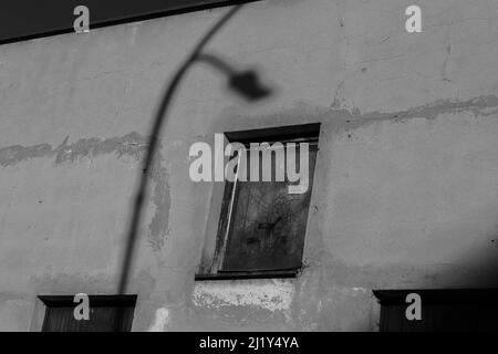 Shadows in street - abstract photo of old window Stock Photo