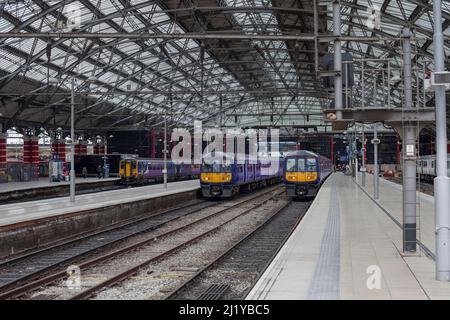 Northern rail class 319 electric multiple unit trains 319376 / 319377 at  Liverpool Lime Street  railway station with class 156 diesel 156460 (left) Stock Photo