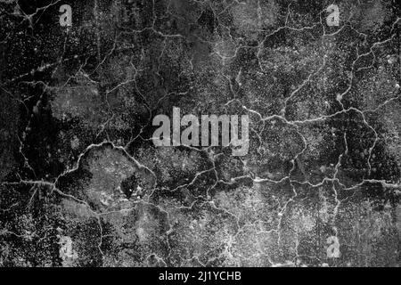 Random cracked old abandoned concrete wall with heavy grunge texture for background Stock Photo