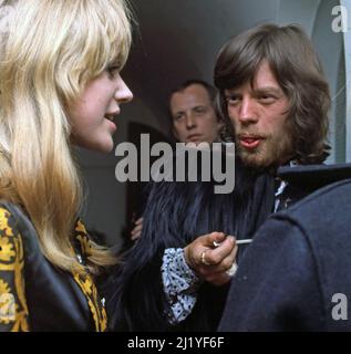 MARIANNE FAITHFULL with Mick Jagger at a reception for the Supremes at  a club in n Kings Road, London, January 1968.Phot0: Tony Gale Stock Photo