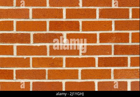 Brick wall with red brick, orange brick background. Orange grunge brick wall, abstract background texture with old dirty and vintage style pattern, no Stock Photo