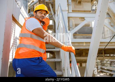 Young foreman working hard at building industry Stock Photo