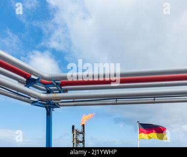 Flag of Germany and industrial gas plant chimney and pipeline. Energy crisis, Russia, Ukraine conflict, Nord Stream 2, Europe, Russian gas... concept Stock Photo