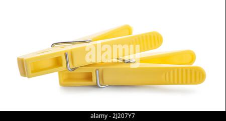 Plastic clothes pins on white background Stock Photo