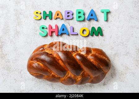 Flag of Israel, mobile phone and text SHABBAT SHALOM on wooden background  Stock Photo - Alamy