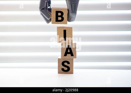 Bias - word from wooden blocks with letters, personal opinions prejudice bias concept, random letters around, white background Stock Photo