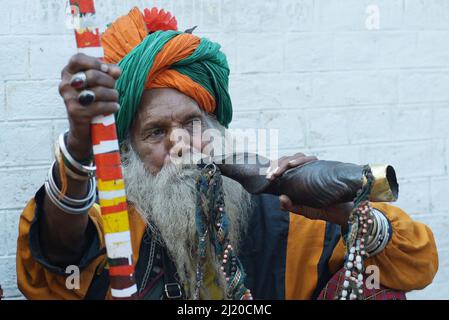 March 27, 2022, Lahore, Punjab, Pakistan: Pakistani devotees and Malangs attend the three-days 434th annual Urs 'Festival of lights' at the shrine of Muslim Sufi saint Shah Hussain, popularly known as Madho Lal Hussain in Lahore. The annual 3 days festival was held at Madhu Lal's shrine on his 434th birth anniversary. Mela Charaghan has its own importance in Lahore's history, as it has been a biggest festival of Lahore in some times.The festival was started with the seasonal Baisakhi festival in old times. Foolproof security arrangements have been made for the devotees. The last day of the Urs Stock Photo