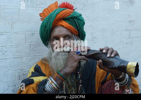 March 27, 2022, Lahore, Punjab, Pakistan: Pakistani devotees and Malangs attend the three-days 434th annual Urs 'Festival of lights' at the shrine of Muslim Sufi saint Shah Hussain, popularly known as Madho Lal Hussain in Lahore. The annual 3 days festival was held at Madhu Lal's shrine on his 434th birth anniversary. Mela Charaghan has its own importance in Lahore's history, as it has been a biggest festival of Lahore in some times.The festival was started with the seasonal Baisakhi festival in old times. Foolproof security arrangements have been made for the devotees. The last day of the Urs Stock Photo