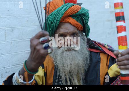 March 27, 2022, Lahore, Punjab, Pakistan: Pakistani devotees and Malangs attend the three-days 434th annual Urs 'Festival of lights' at the shrine of Muslim Sufi saint Shah Hussain, popularly known as Madho Lal Hussain in Lahore. The annual 3 days festival was held at Madhu Lal's shrine on his 434th birth anniversary. Mela Charaghan has its own importance in Lahore's history, as it has been a biggest festival of Lahore in some times.The festival was started with the seasonal Baisakhi festival in old times. Foolproof security arrangements have been made for the devotees. The last day of the Urs Stock Photo