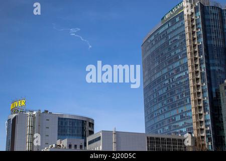 Kyiv, Ukraine. 28th Mar, 2022. Smoke trails over the city of Kyiv. Daily life in the city of Kyiv amid Russian aggression. Credit: SOPA Images Limited/Alamy Live News Stock Photo