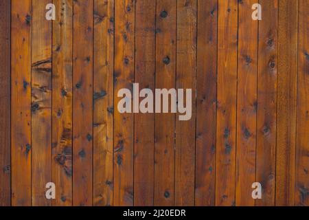 Wooden wall texture belonging to a fence line outside in the yard. Perfect natural photo pattern. Stock Photo