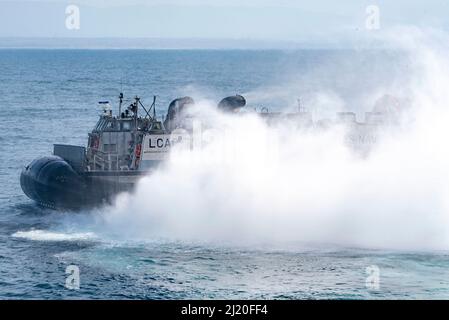 Landing Craft Unit departs the well deck of the amphibious assault ship ...