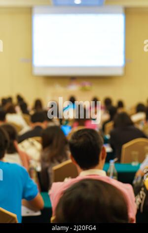 Blurred group of people seminar meeting in hotel ballroom business project Stock Photo