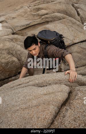 Mountaineers who struggle up steep valleys, high angle view - stock photo Stock Photo