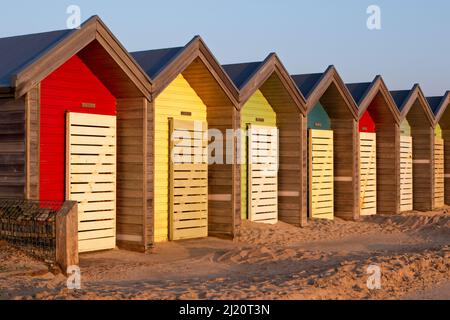 These brightly coloured beach huts are the only ones in Northumberland and stand on the South Beach Promenade in Blyth. Stock Photo