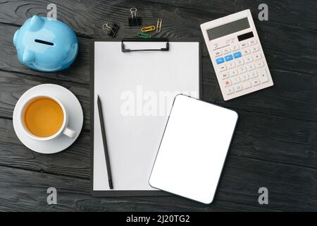 Blank paper on clipboard with space on dark gray background Stock Photo