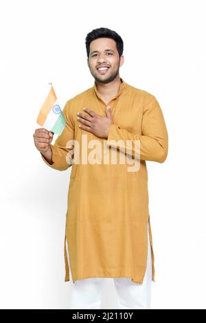 Indian man holding indian flag and showing patriotism. Stock Photo