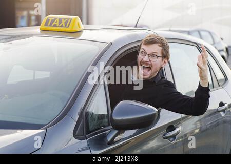 Emotional portrait of angry male taxi driver. Stock Photo