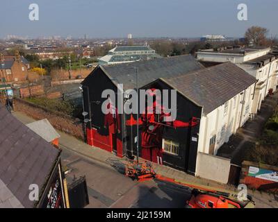 A mural by local artist John Culshaw of Liverpool player Mohamed Salah, Anfield Road, Liverpool. Picture date: Tuesday March 29, 2022. Stock Photo