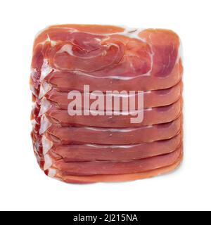 Sliced Spanish raw ham, serrano ham, close up isolated on white background Stock Photo