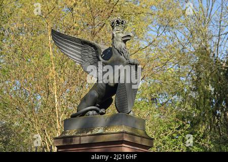 Former Mühlburg city gate with Baden coat of arms in the castle park in Karlsruhe, Baden-Württemberg, Germany Stock Photo