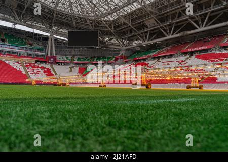 Kazan, Russia. 2022 March 28. Assimilation lighting in soccer stadium. Lighting assimilation off grass. Aerial view of light therapie in stadium. The Stock Photo