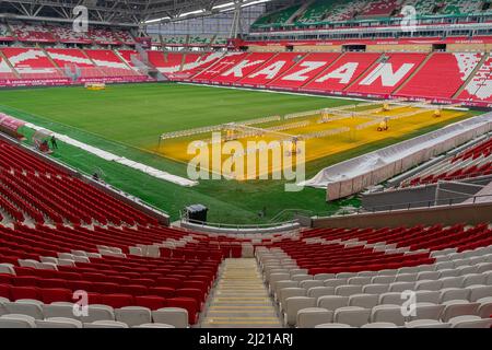 Kazan, Russia. 2022 March 28. Descending onto the stadium football pitch. Stairs between rows of seats. Ak Bars Arena or Kazan Arena Stock Photo