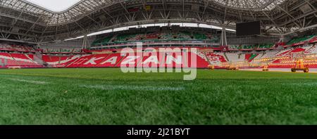 Kazan, Russia. 2022 March 28. Stadium Ak Bars Arena or Kazan Arena. View of the stadium football pitch. View from the lawn. Panoramic view Stock Photo