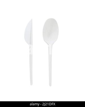 White plastic disposable spoon and knife isolated on white background.  Stock Photo